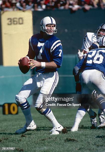 Bert Jones of the Baltimore Colts drops back to pass in a circa mid 1970's NFL game against the Oakland Raiders in Baltimore, Maryland. Jones played...