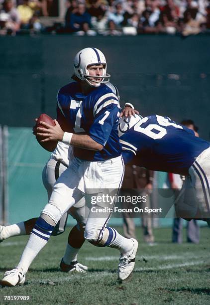 Bert Jones of the Baltimore Colts drops back to pass in a circa mid 1970's NFL game against the Oakland Raiders in Baltimore, Maryland. Jones played...