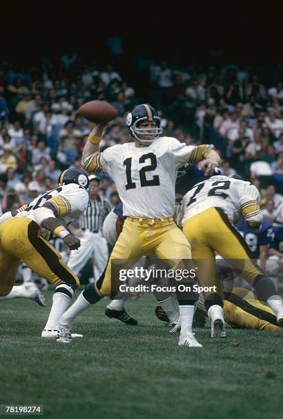 S: Quarterback Terry Bradshaw of the Pittsburgh Steelers is set to throw a pass against the Baltimore Colts during a mid circa 1970's NFL football...