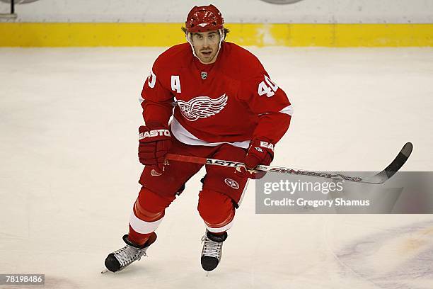 Henrik Zetterberg of the Detroit Red Wings skates during the NHL game against the Calgary Flames at Joe Louis Arena on November 27, 2007 in Detroit,...