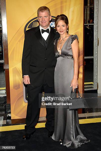 Jeff Burton, driver of the AT&T Mobility Chevrolet, and his wife Kim arrive at the NASCAR Nextel Cup Series Awards Ceremony at The Waldorf Astoria on...