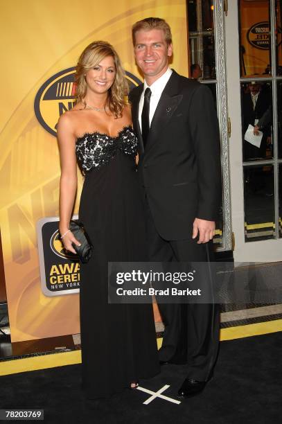 Nascar Driver Clint Bowyer and his girlfriend Athena Elizabeth Barber arrive at the NASCAR Nextel Cup Series Awards Ceremony at The Waldorf Astoria...