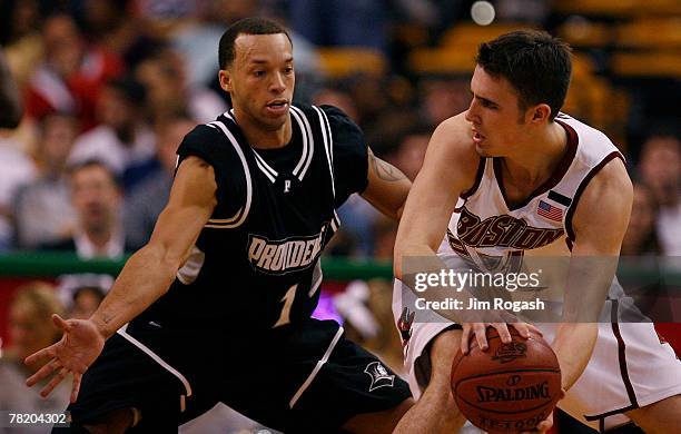 Jeff Xavier of the Providence College Friars presses Tyler Roche of the Boston College Eagles during Game 2 of the Hartford Hall of Fame Showcase at...