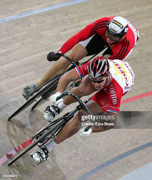 Kevin Sireau of France, riding for the Cofidis team, in route to beating Carsten Bergemann of Germany in the men's sprint quarterfinals during day...