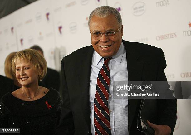 Actor James Earl Jones arrives with wife Cecilia Hart at a reading of A. R. Gurney's 'Love Letters' performed by him with Dame Elizabeth Taylor, at...