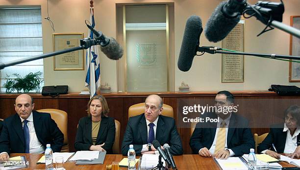 Israel's Prime Minister Ehud Olmert , Foreign Minister Tzipi Livni , Transport Minister Shaul Mofaz and Cabinet Secretary Oved Yehezkel attend the...