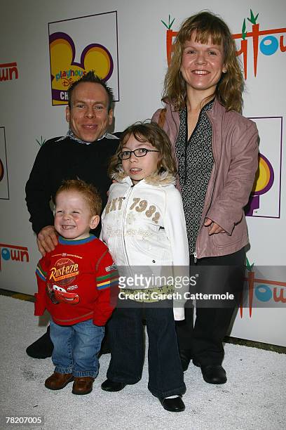 Actor Warwick Davis and family arrive at the Playhouse Disney Celebrity Christmas Party on December 2, 2007 in London, England.