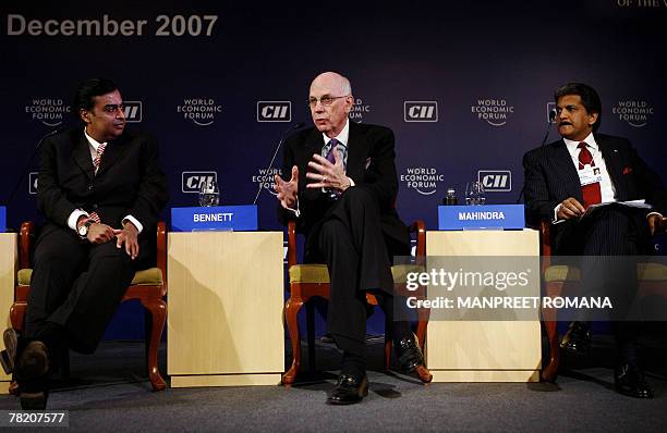 Republican Senator from the US state of Utah, Robert F. Bennett gestures as he answers a question during the India Economic Summit as Chairman and...