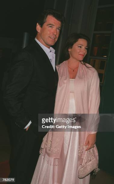 Actor Pierce Brosnan and his fiancee, journalist Keely Shaye Smith pose at the premiere of "Why Are We Here?" the Public Awareness Campaign produced...