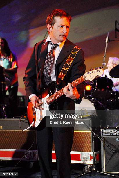 Actor Michael J. Fox performs at "A Groovy Thing Happened on the Way to Cure Parkinson's" benefit for The Michael J. Fox Foundation for Parkinson?s...
