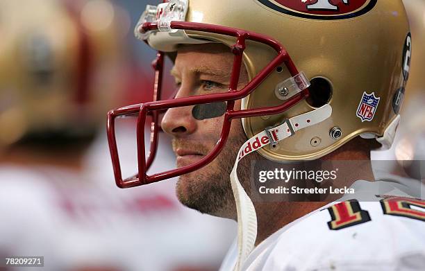 Trent Dilfer of the San Francisco 49ers watches on from the sidelines against the Carolina Panthers during their game at Bank of America Stadium on...