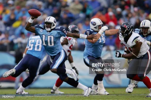 Quarterback Vince Young of the Tennessee Titans makes a break against the Houston Texans on December 02, 2007 at LP Field in Nashville, Tennessee.