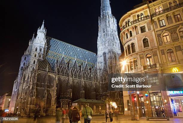 Stephansdom in Stephansplatz is lit up at night in Vienna, Austria.