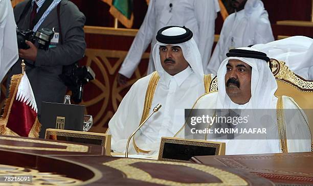 Qatari Emir sheikh Hamad Bin Khalifa al-Thani and Qatari Crown Prince Sheikh Tamim Bin Hamad al-Thani Gulf Cooperation Council summit in Doha, 03...