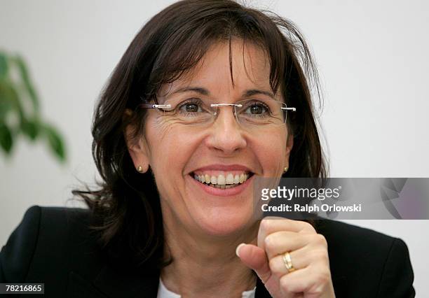 Andrea Ypsilanti, German Social Democrats gubernatorial candidate in the German state of Hesse, smiles during a meeting at the party's headquarters...
