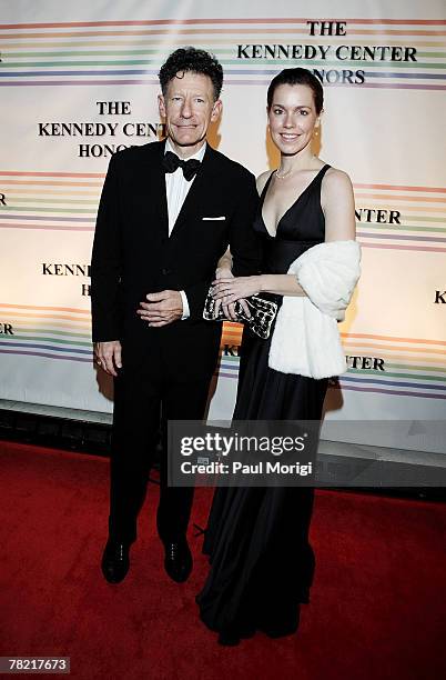 Lyle Lovett and April Kimble pose for the cameras at the 30th annual Kennedy Center Honors on December 2, 2007 at the John F. Kennedy Center for the...