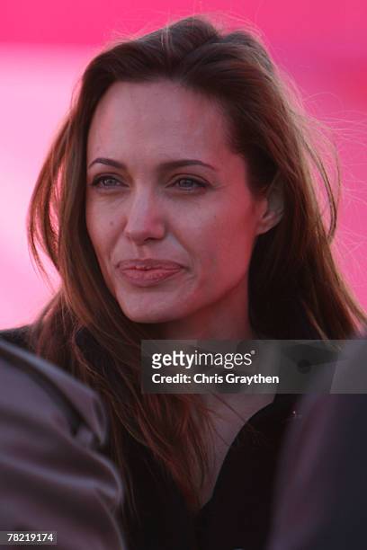 Actress Angelina Jolie attends a press conference by actor Brad Pitt to unveil the site and design of his "Make It Right" program on December 3, 2007...