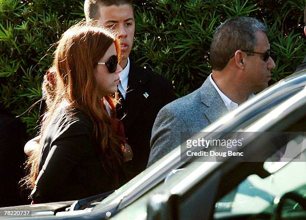 Washington Redskins safety Sean Taylor's longtime girlfriend Jackie Garcia leaves his funeral services at Pharmed Arena on December 3, 2007 in Miami,...