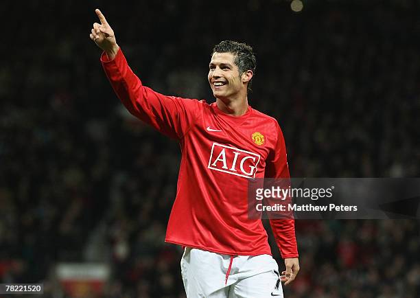 Cristiano Ronaldo of Manchester United celebrates scoring their second goal during the Barclays FA Premier League match between Manchester United and...