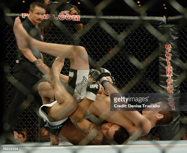 Lightweight UFC Fighters Cole Miller and Leonard Garcia compete during UFC Fight Night at The Pearl at The Palms Casino Reosrt on September 19, 2007...