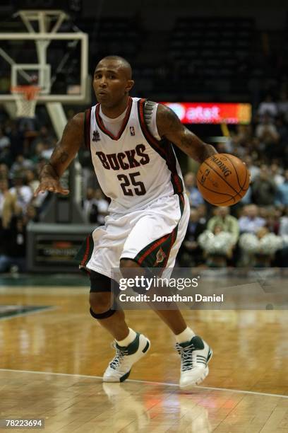 Maurice Williams of the Milwaukee Bucks handles the ball during the game against the Memphis Grizzlies on November 14, 2007 at the Bradley Center in...