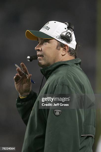 Head coach Mike McCarthy of the Green Bay Packers looks on from the sidelines during the NFL game against the Minnesota Vikings at the Metrodome on...