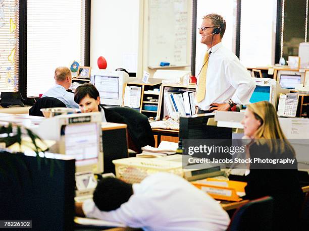 businesspeople in office - peeking cubicle stock pictures, royalty-free photos & images