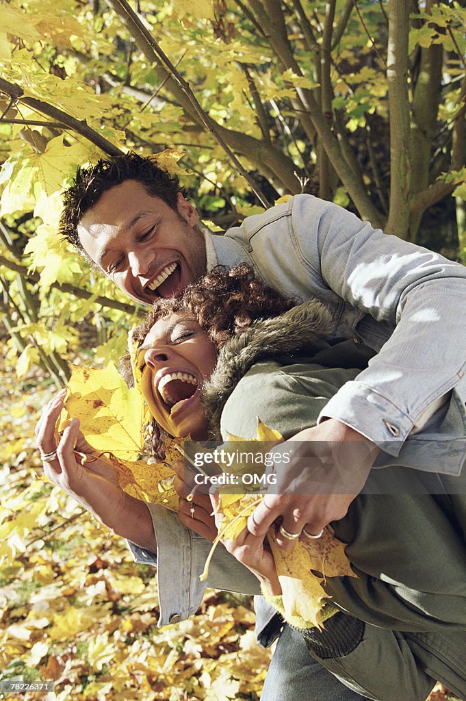 Couple playing outdoors
