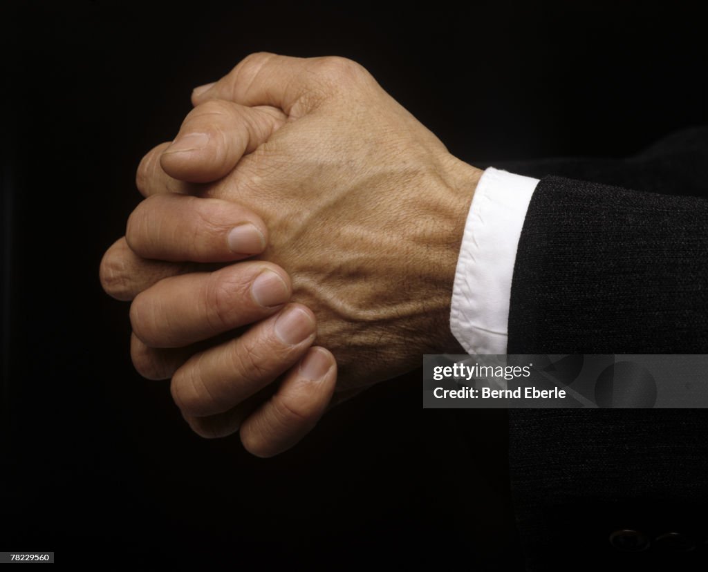 Floder Hand Closeup Of Folded Hands High-Res Stock Photo - Getty Images
