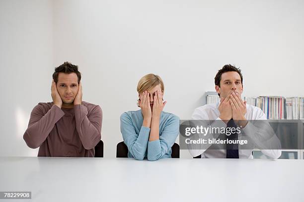 three office workers doing hear no evil see no evil speak no evil - 3 wise monkeys stock pictures, royalty-free photos & images