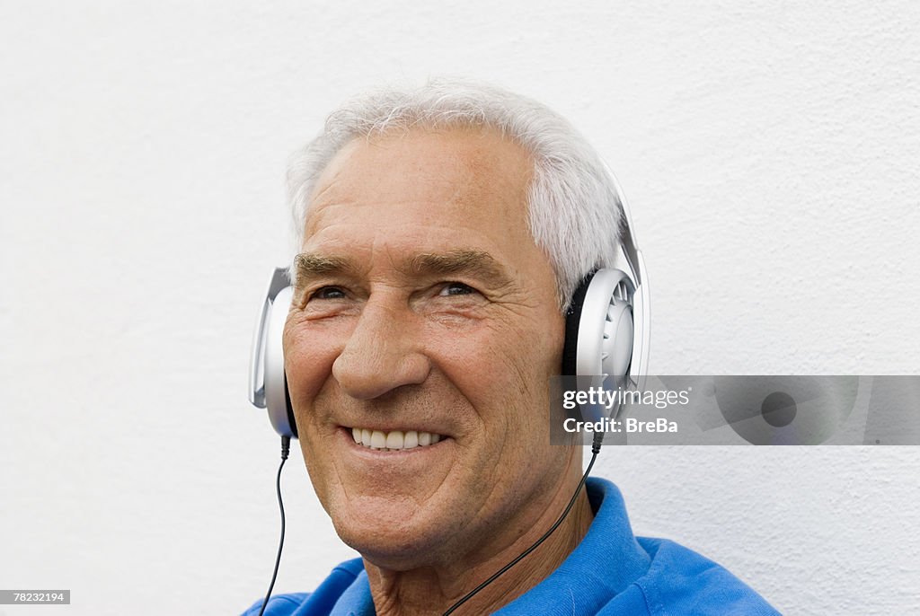 Content looking man listening to music