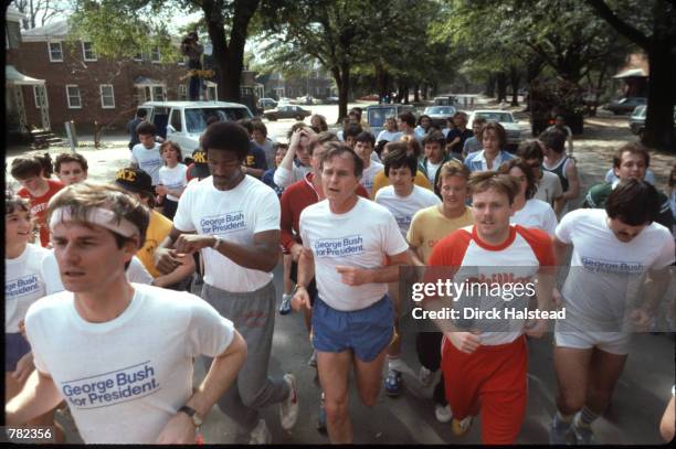 Supporters of Republican presidential candidate George Bush run February 1980 in South Carolina. Bush is campaigning for the presidential primary...