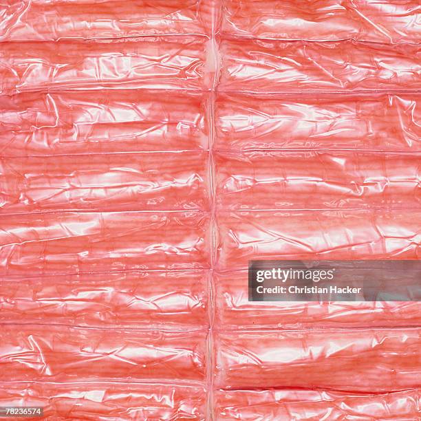 still life of surimi in plastic packaging - surimi photos et images de collection