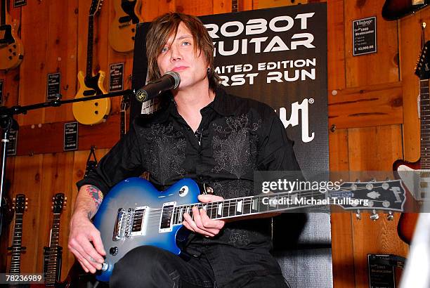 Musician Johnny Rzeznik of the rock group the Goo Goo Dools demonstrates the new self-tuning, limited edition Gibson Robot Guitar at the Guitar...