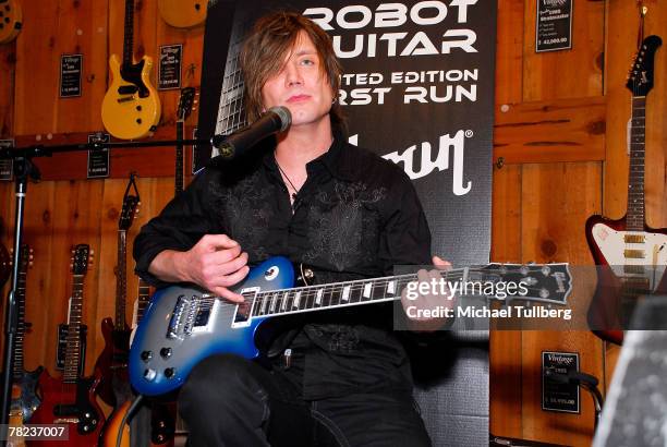 Musician Johnny Rzeznik of the rock group the Goo Goo Dools demonstrates the new self-tuning, limited edition Gibson Robot Guitar at the Guitar...