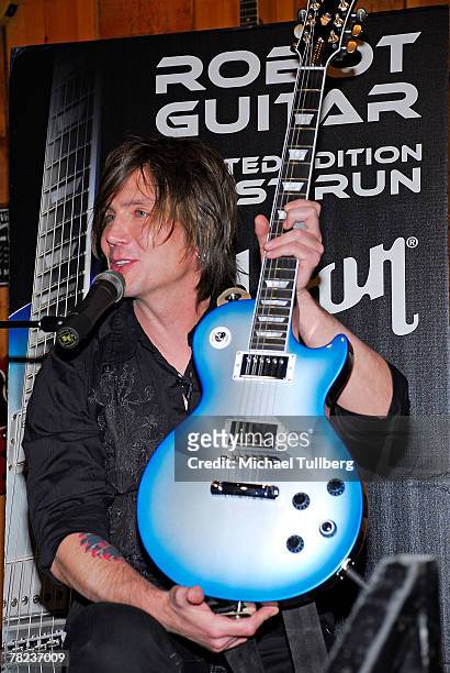 Musician Johnny Rzeznik of the rock group the Goo Goo Dools demonstrates the new self-tuning, limited edition Gibson Robot Guitar at the Guitar...