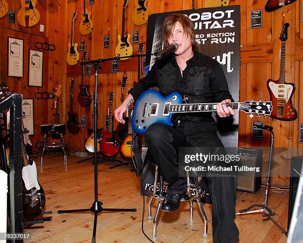 Musician Johnny Rzeznik of the rock group the Goo Goo Dools demonstrates the new self-tuning, limited edition Gibson Robot Guitar at the Guitar...