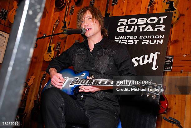 Musician Johnny Rzeznik of the rock group the Goo Goo Dools demonstrates the new self-tuning, limited edition Gibson Robot Guitar at the Guitar...