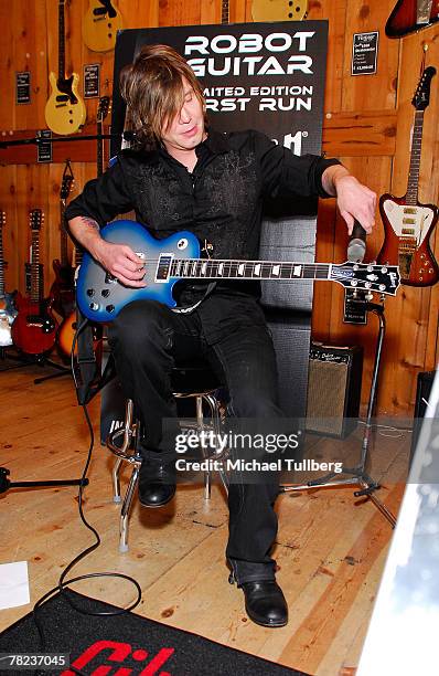 Musician Johnny Rzeznik of the rock group the Goo Goo Dools demonstrates the new self-tuning, limited edition Gibson Robot Guitar at the Guitar...