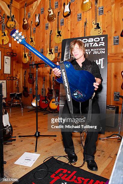 Musician Johnny Rzeznik of the rock group the Goo Goo Dools demonstrates the new self-tuning, limited edition Gibson Robot Guitar at the Guitar...