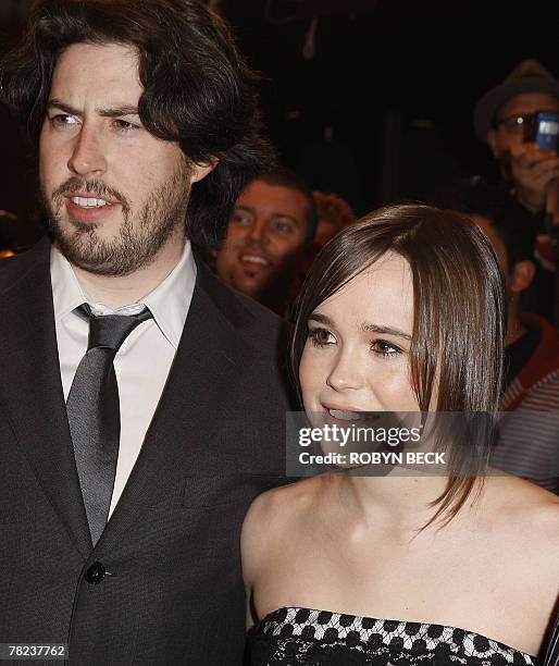 Director Jason Reitman and actress Ellen Page pose on the red carpet for the premiere of "Juno" at the Village Theatre in Westwood, California, 03...