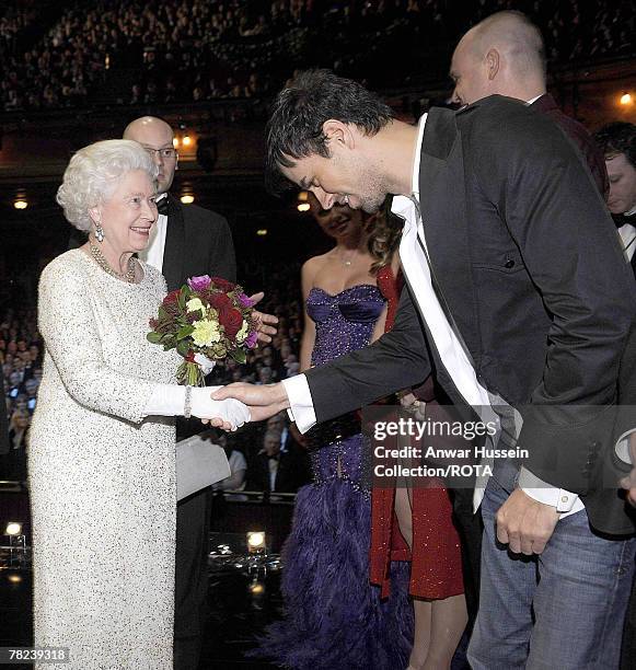 Queen Elizabeth ll meets singer Enrique Iglesias following the Royal Variety performance at the Empire Theatre on December 3, 2007 in Liverpool,...