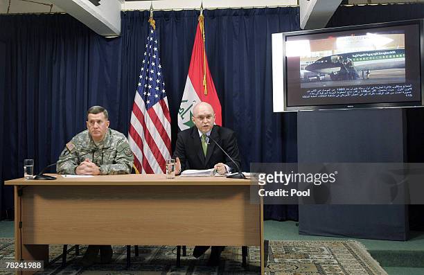 Major General Kevin Bergner , spokesman for Multinational Forces Iraq, listens while Philip Reeker, Advisor of the U.S. Ambassador to Iraq, speaks as...