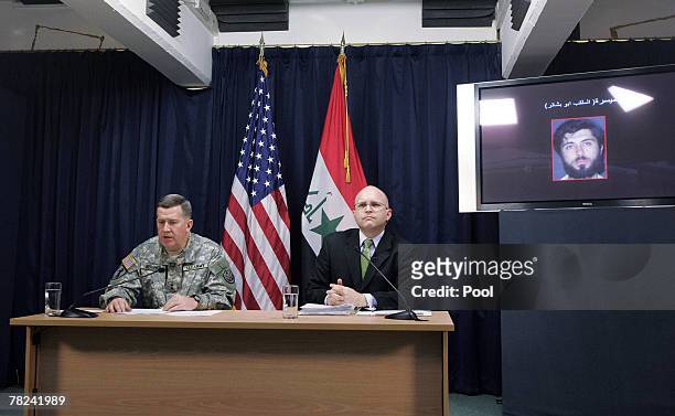 Major General Kevin Bergner , spokesman for Multinational Forces Iraq, speaks while Philip Reeker, Advisor of the U.S. Ambassador to Iraq, listens as...