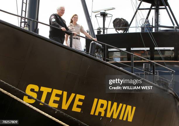 Terri Irwin , wife of the late crocodile hunter Steve Irwin, and Captain Paul Watson pose in front of the newly named ship 'Steve Irwin', after a...