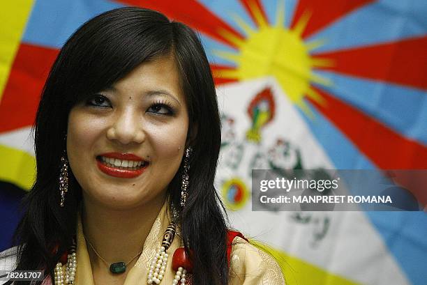 Miss Tibet 2006 Tsering Chungtak poses for a picture during a press conference in New Delhi, 05 December 2007. A Tibetan contestant barred from...