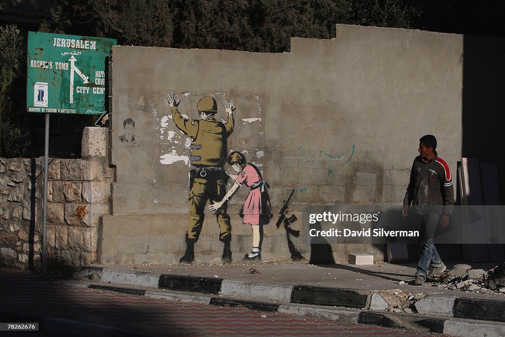 Banksy Graffiti Art On West Bank Barrier