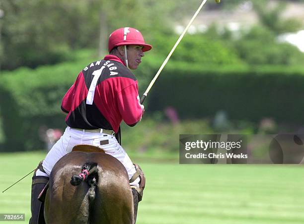 Actor Tommy Lee Jones sits astride his mount as he competes with his San Saba polo team at the Santa Barbara Polo & Racquet Club July 30, 2000 in...