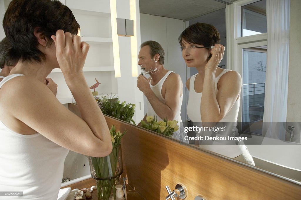 Reflection of a couple in the bathroom