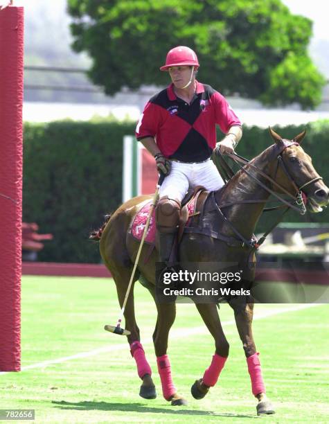 Actor Tommy Lee Jones sits astride his mount as he competes with his San Saba polo team July 30, 2000 at the Santa Barbara Polo & Racquet Club in...